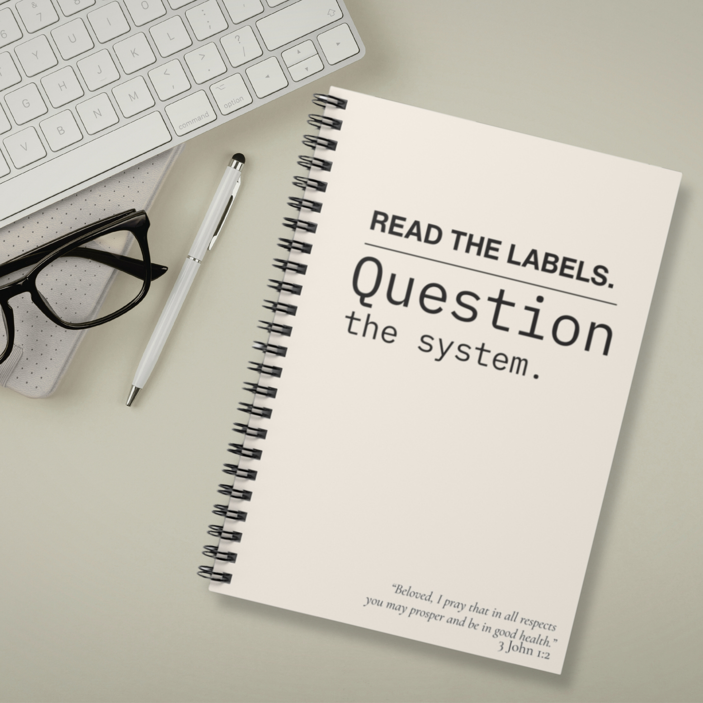 Notebook — "Read the Labels. Question the System." Spiral Ruled Journal - Cream
